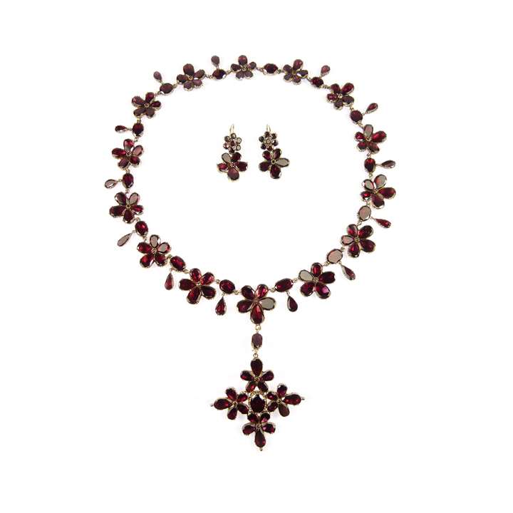 18th century garnet flowerhead cluster suite of necklace with cross brooch-pendant and pair of earrings
